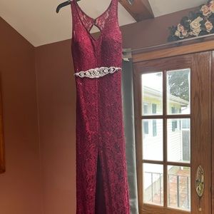 Burgundy prom dress with beading and slit